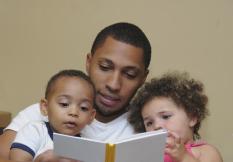 father-reading-with-children